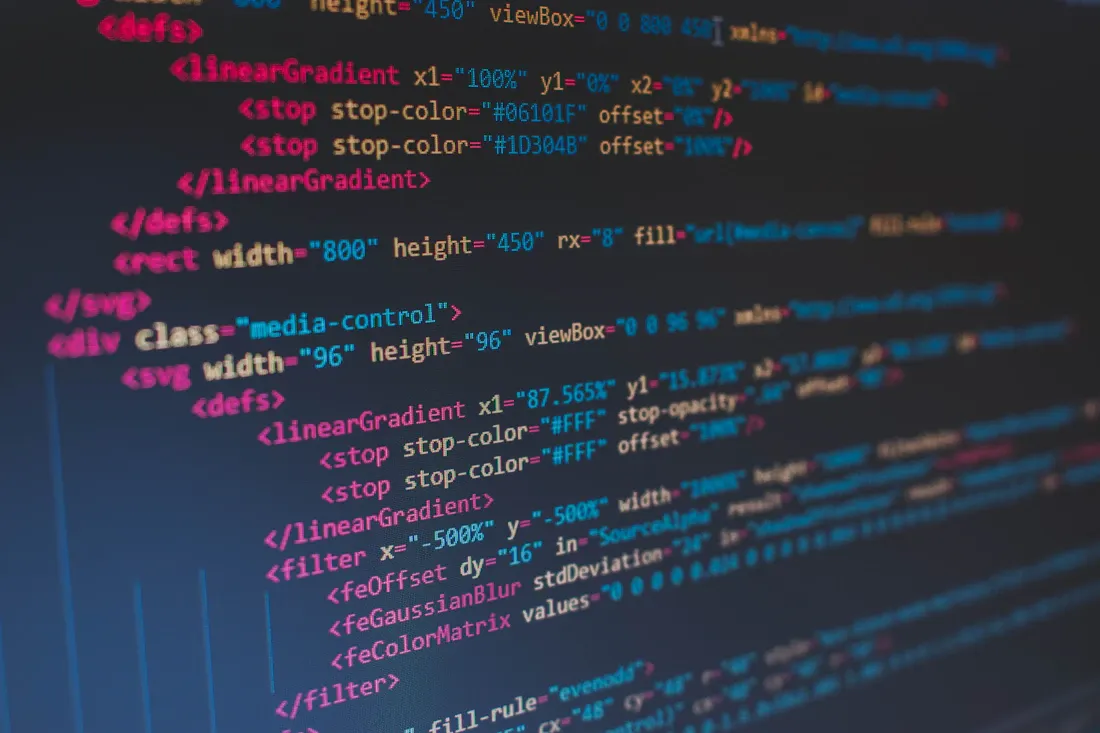 Close-up of structured HTML source code on a dark editor theme